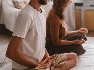 A person practicing deep breathing exercises