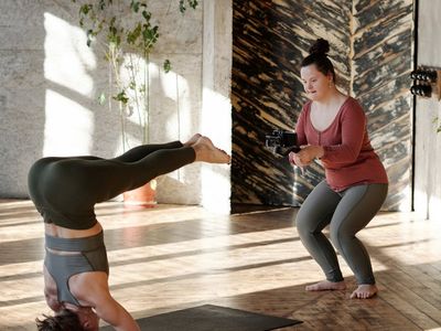 Empty yoga studio with soft sunlight on floor